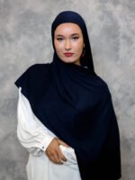 Deep navy blue hijab styled elegantly with a smooth drape.