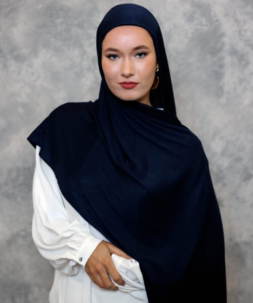 Deep navy blue hijab styled elegantly with a smooth drape.