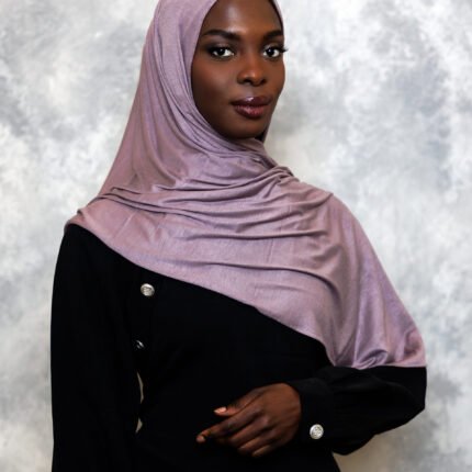 Shiny mauve satin hijab with soft lavender undertones, styled in an elegant drape.