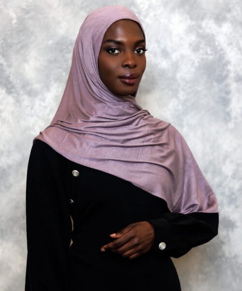 Shiny mauve satin hijab with soft lavender undertones, styled in an elegant drape.